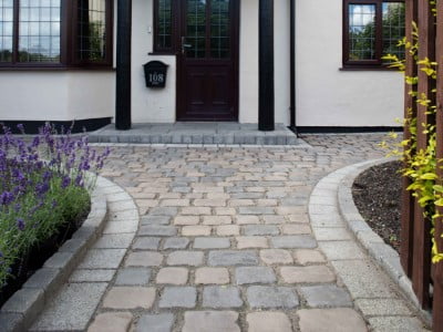 Leicester Paving and Patio Contractors Laying Cobblestones in Leicester