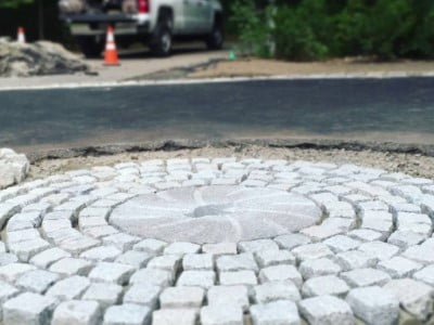 Leicester Paving and Patio Contractors Laying Cobblestones in Leicester